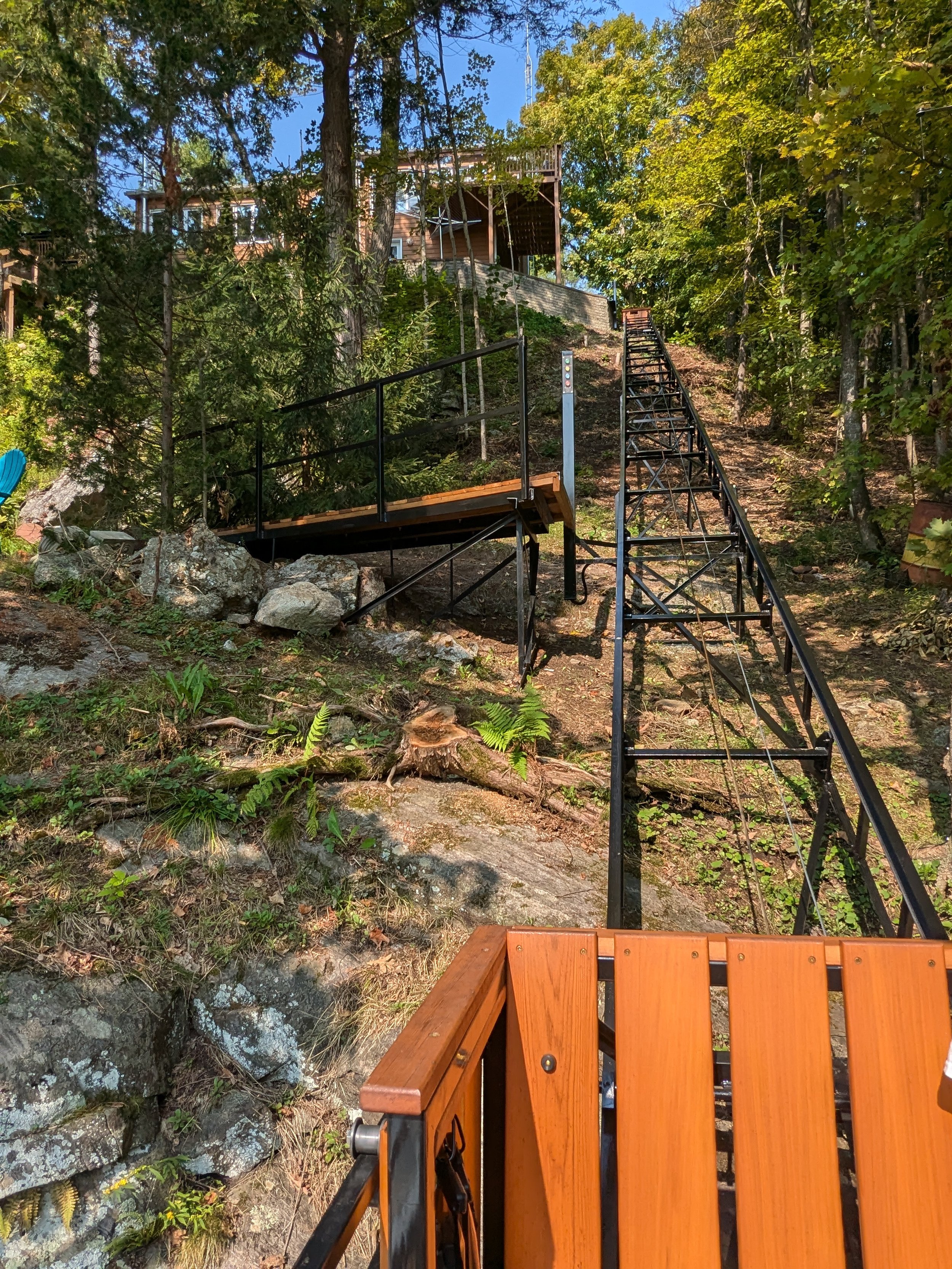View from the bottom station. The landings were added later by the client's contractor, carefully built to complement the design of the lift.