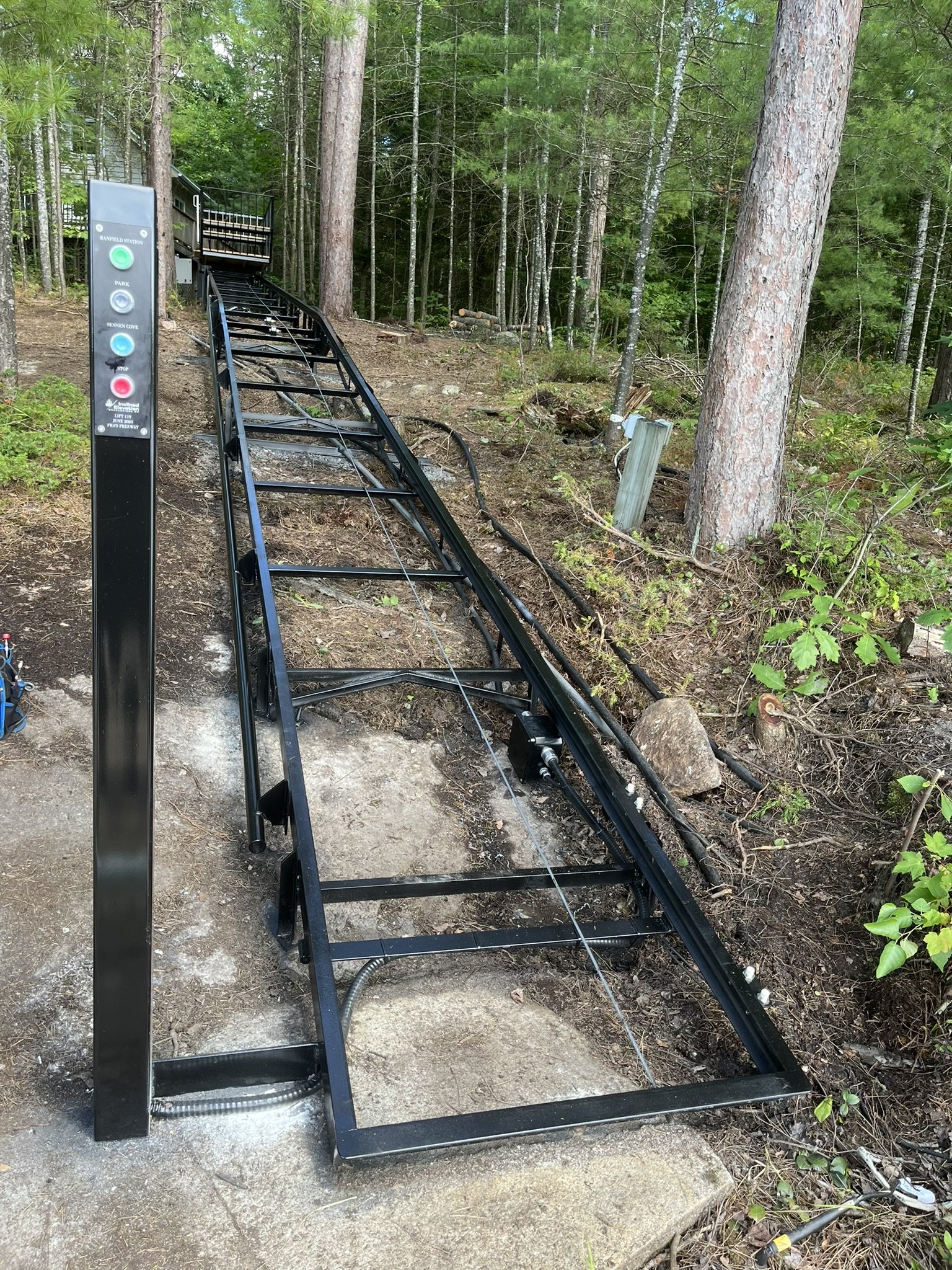 The track was lowered as much as possible and extended down the hillside to meet the client's needs.