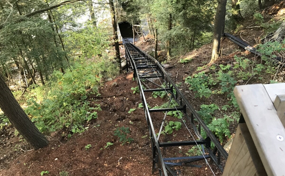 A view down the finished track. As a test, we once sat a full wine glass on the outside corner of the car railing and ran the car up and down without spilling a drop.