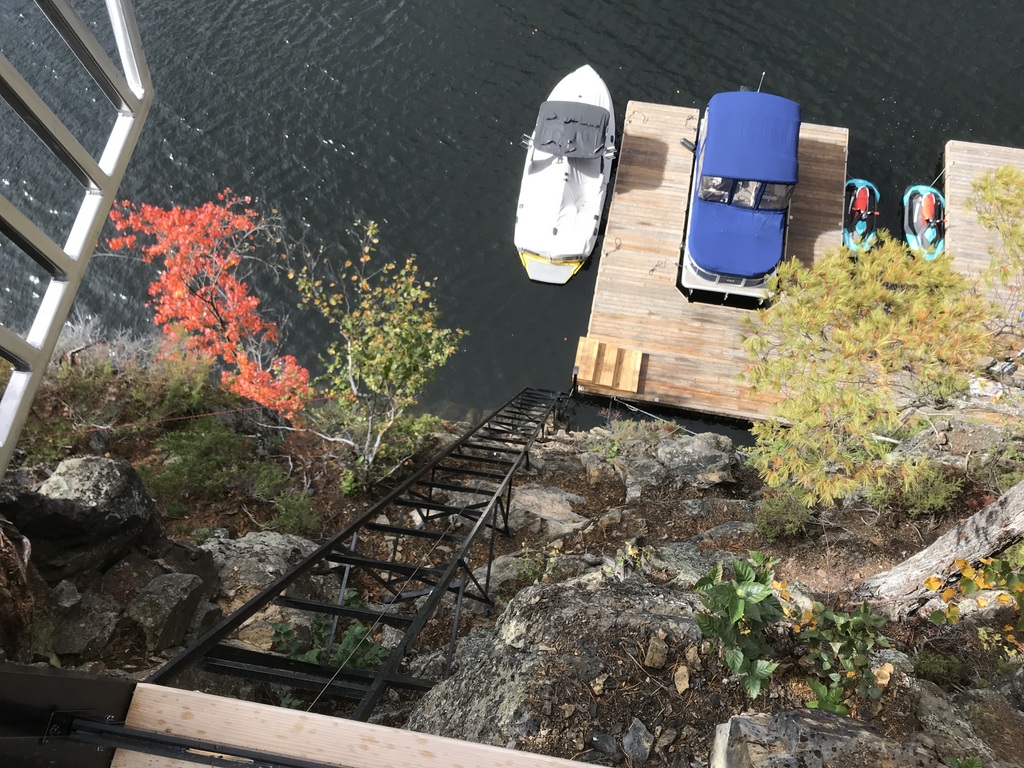 Looking down the track to the dock can be an exhilarating experience. The lift and the ride are rock solid. Premier Docks did another fine job repositioning the floating dock so it meets the lift perfectly.