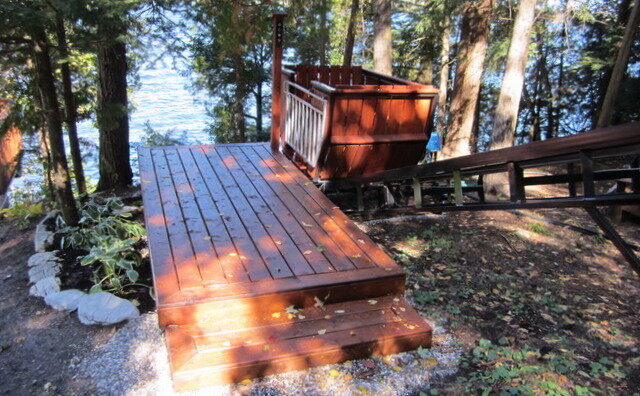 The owner built this simple lower-station platform and incorporated the pre-wired button-box post we had left. The platform is so close to the ground and so small that no railings or permits were required.