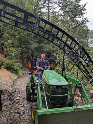 Getting the tractor under the track was a must.